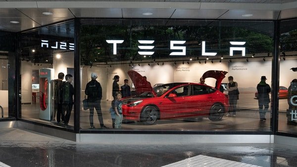 Despite EV price war, Tesla may see less profit this quarter